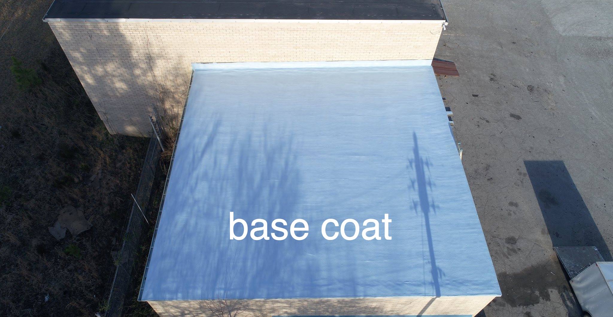Picture of the base coat on a roofing project.