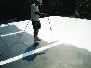 One of our specialists working hard on a roof restoration project!